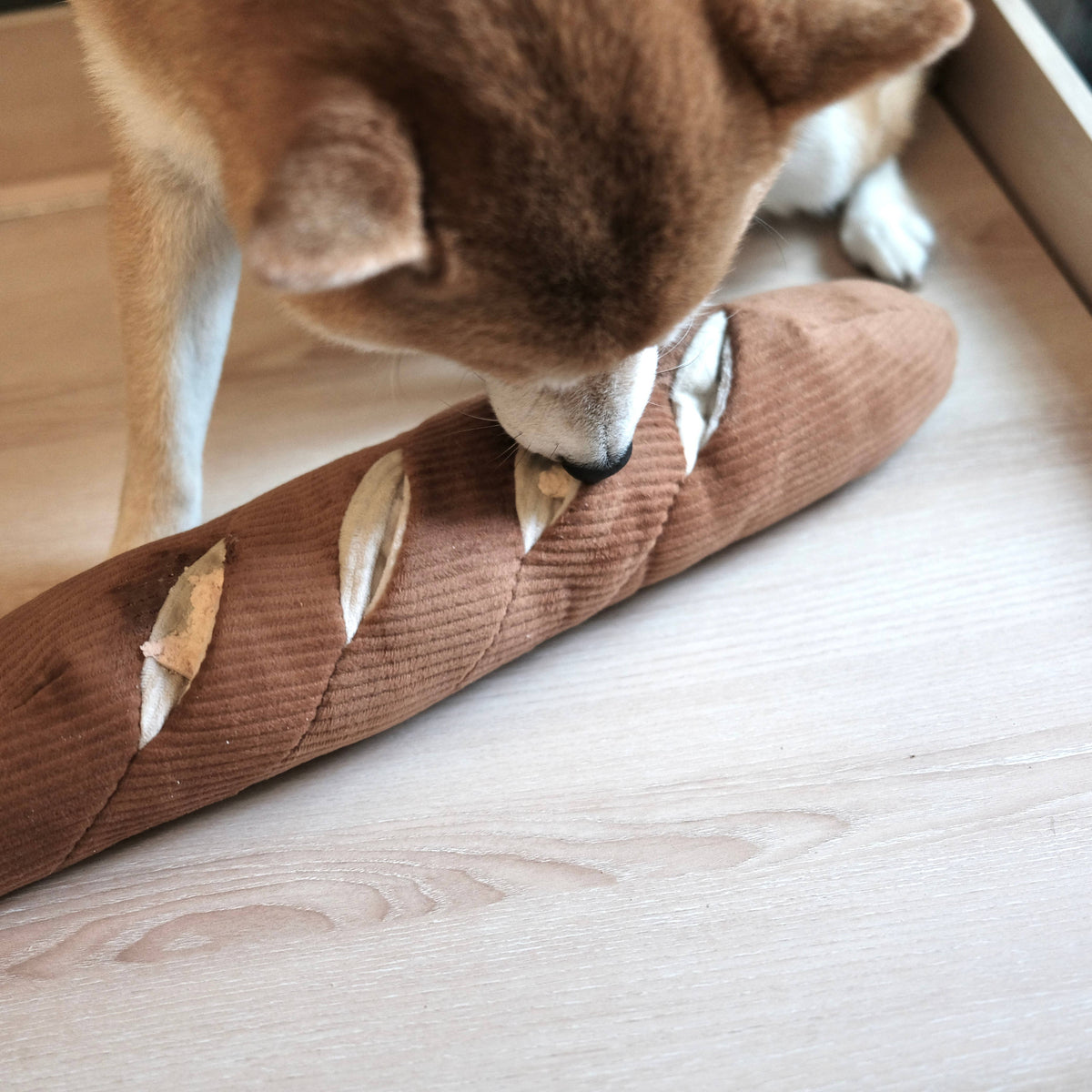 Baguette enrichment dog toy